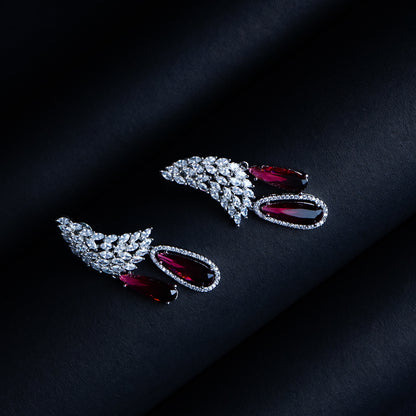Phoenix Rising Crimson Red CZ Dangler Earrings Close Up | Indian Jewellery | Saajo